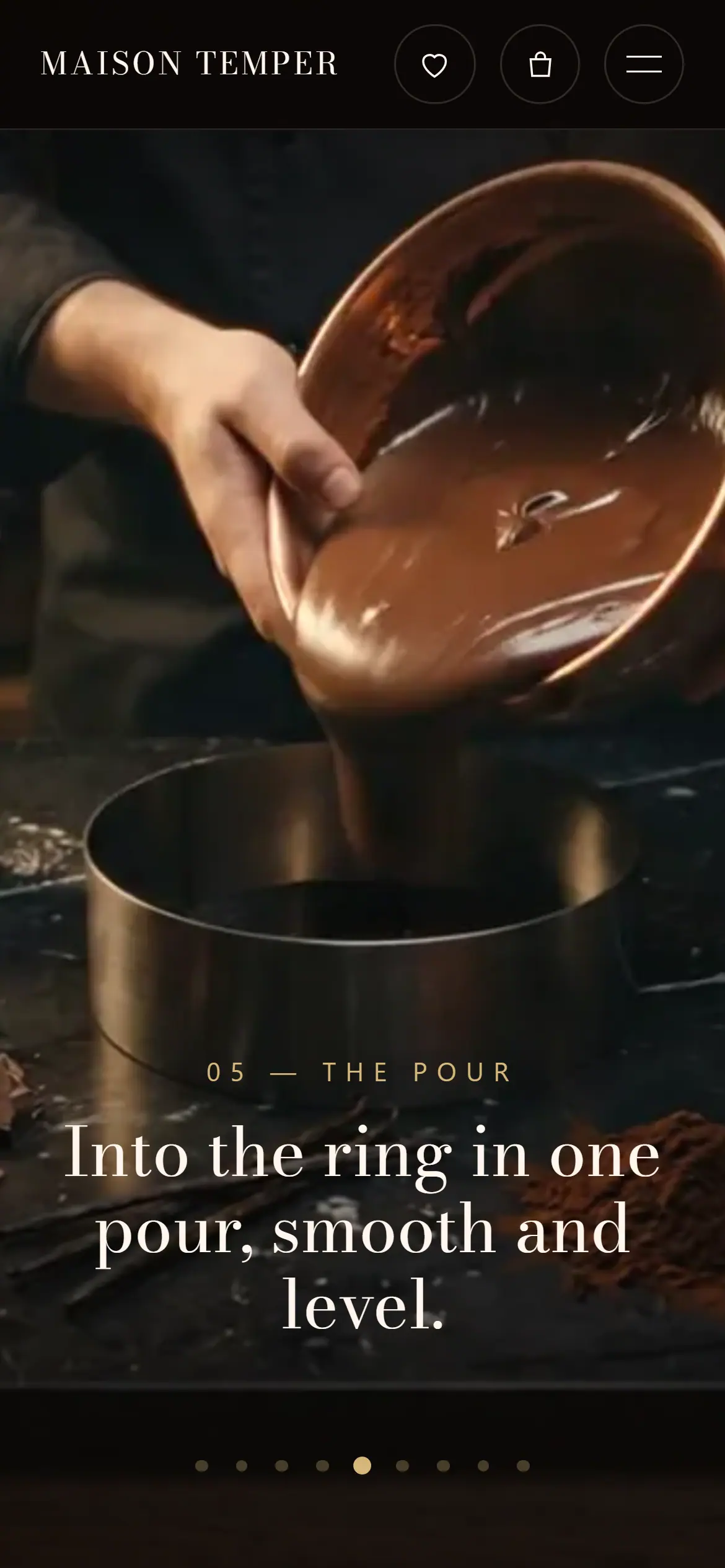 The Maison Temper film on a phone at chapter five, a hand pouring chocolate batter from a copper bowl into a cake ring, with the line Into the ring in one pour, smooth and level
