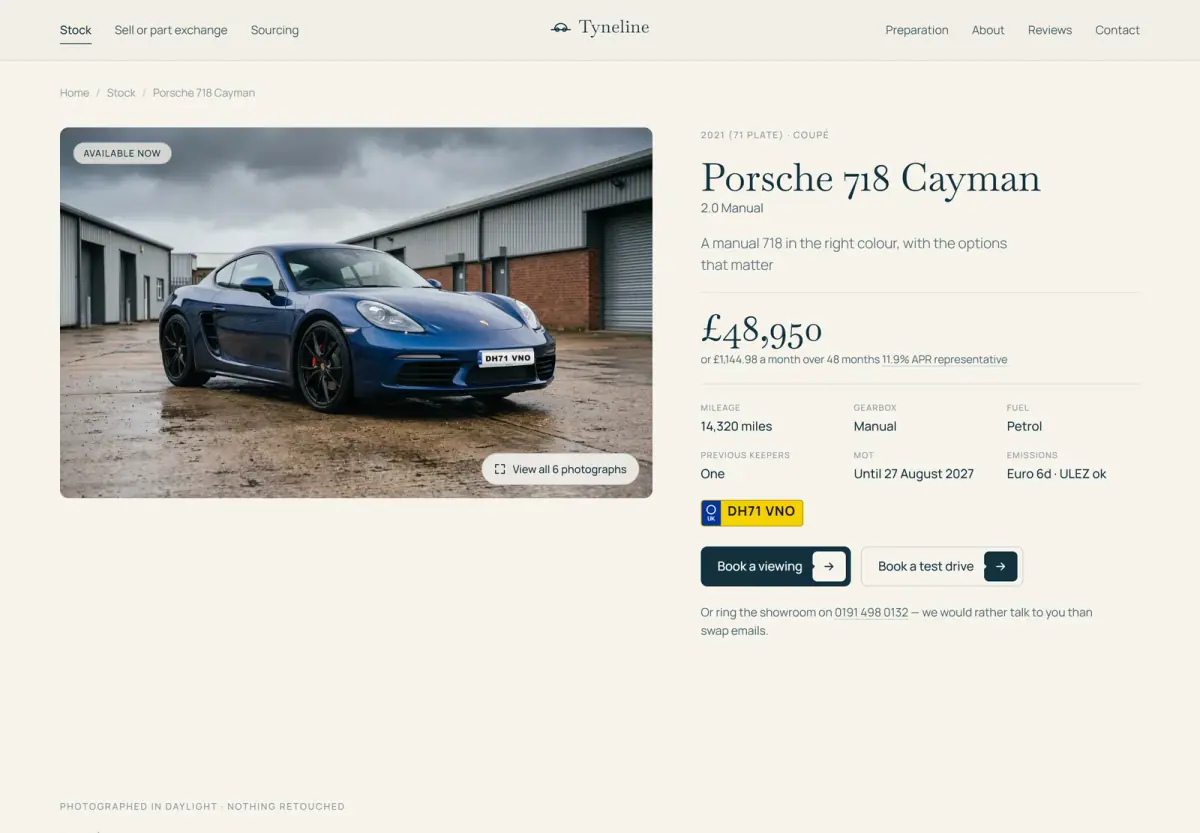 A Porsche 718 Cayman vehicle page: gallery on the left, price, finance example, mileage, MOT, keepers, emissions and a yellow UK number plate on the right